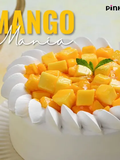Our Mango Mania cake is a seasonal favorite. We top a light, airy eggless sponge with fresh cream and heaps of diced, sweet mangoes for a true taste of summer.