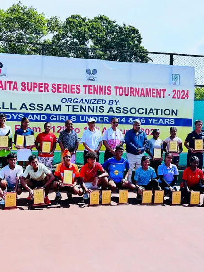 A group photo of all the winners and finalists at the AITA Super Series tournament in Guwahati, featuring our player Eshita.