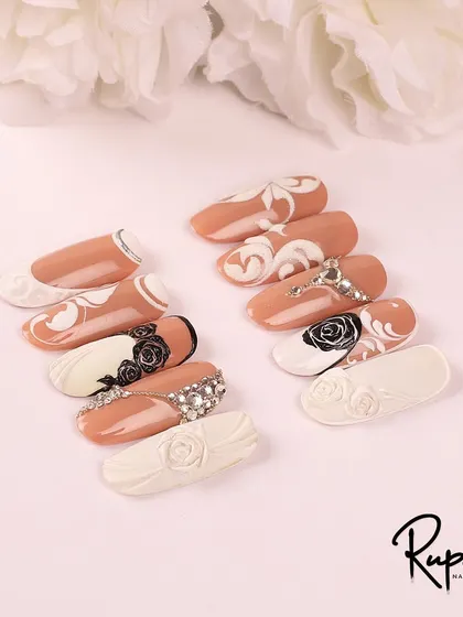 Another view of my bridal nail art collection, showcasing different ways to incorporate swirls, roses, and crystals for an elegant wedding day look.