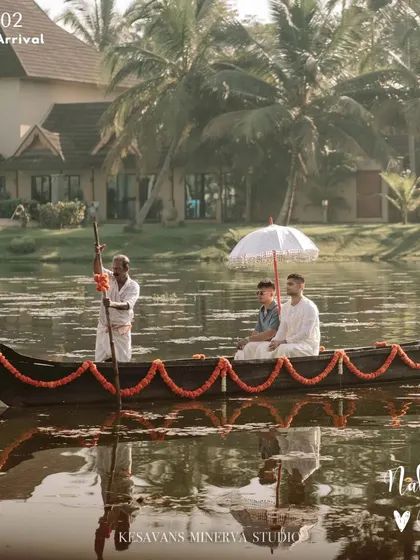 A unique arrival for a unique story. The bride and groom made their entrance on a traditional boat across the serene Kerala backwaters, a poetic start to their lakeside wedding ceremony.