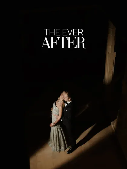 "The Ever After" begins here. A dramatic, high-contrast portrait within the stone corridors of Suryagarh, Jaisalmer. The single stream of light illuminates the couple, creating a powerful, movie-poster-like image that speaks of destiny and timeless love.