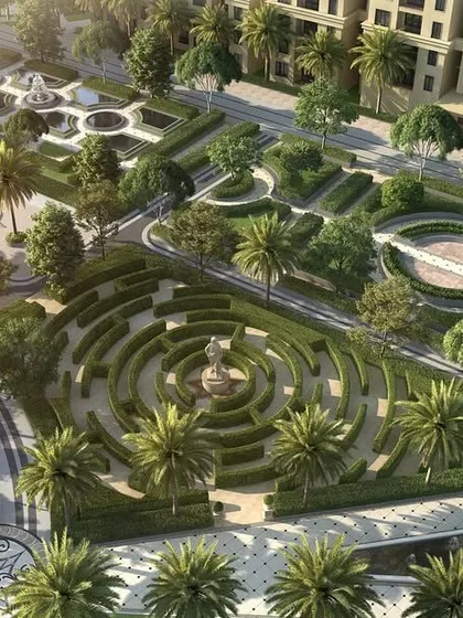 This detailed aerial view highlights the intricate, Roman-inspired garden designs at Casagrand Sun City, featuring a hedge maze and formal geometric layouts that create a sense of timeless elegance.