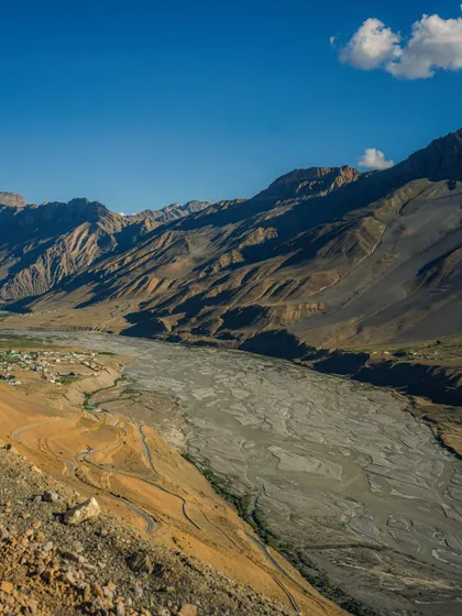 An aerial-like view of a braided river in the Spiti Valley. This high-angle shot reveals the intricate patterns of the landscape.