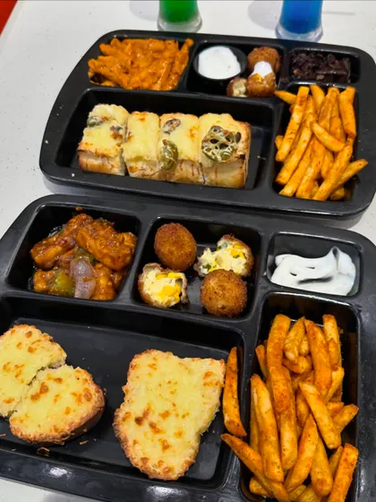 A top-down view of my two most popular offerings, the Party Platter and the Italian Platter. Each is designed to provide a variety of tastes and textures in one convenient tray.