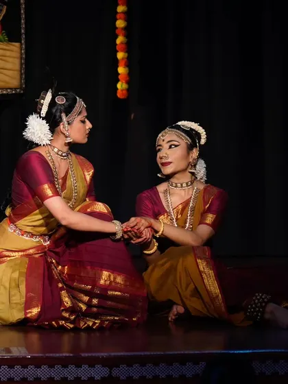 A moment of reconciliation in the 'Rusali Radha' piece. The choreography arc takes the audience through the entire emotional journey from conflict to resolution.