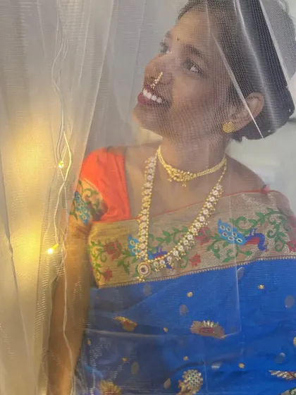 A joyful moment captured. This look features a simple choker and long necklace, showing that you can shine brightly even with more understated traditional pieces.