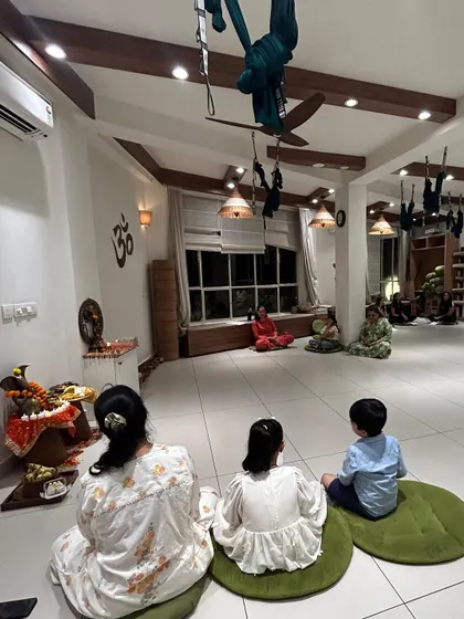 Our space is for everyone. Here, a family sits together during our Ganesh Chaturthi pooja, sharing a moment of devotion. We believe in celebrating our traditions together, creating memories and passing on our values to the next generation.
