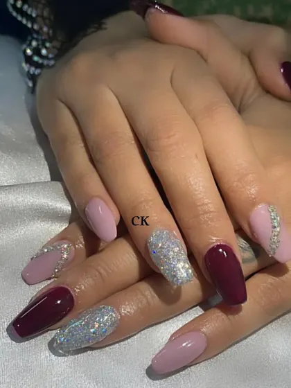 A beautiful and balanced set for a friend, combining solid maroon, soft pink, and a full-coverage silver glitter nail with rhinestone accents.