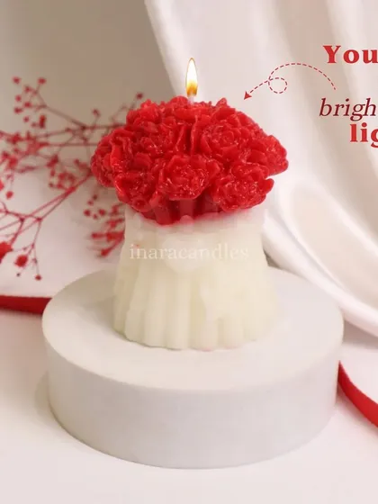 You're my brightest light. This candle, shaped like a beautiful bouquet of red roses, is the perfect romantic gesture to light up your Valentine's Day.