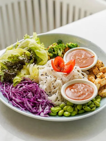 A colorful and healthy Buddha bowl, photographed to emphasize the variety of fresh ingredients. Our styling makes healthy food look exciting and delicious, appealing to a health-conscious audience.
