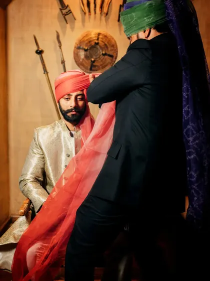 A collage showing the groom's journey, from getting ready and receiving blessings to his grand baraat and the emotional first look at his bride.