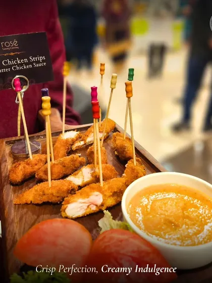 Crisp perfection meets creamy indulgence with our Crispy Chicken Strips and Butter Chicken Sauce. This appetizer is a perfect example of our innovative fusion cuisine.