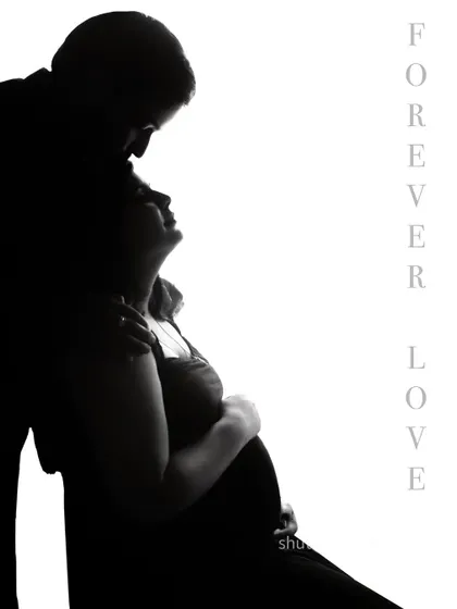 "Forever Love." This intimate silhouette captures a tender moment as the father-to-be kisses his partner's forehead. The high-contrast lighting creates a timeless and romantic fine-art portrait.