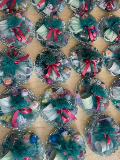 Another angle of the multiple Christmas gift hampers, showcasing the consistency of a large order.