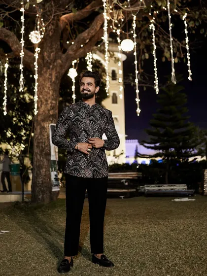Under the fairy lights, ready to create some magic. The ambiance of an event is everything.