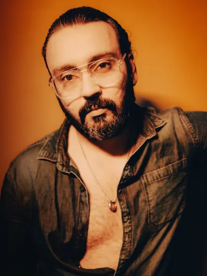 A more serious, intense self-portrait. This reflects the focus and determination I bring to my photography.