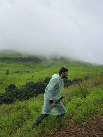 Another shot of me trekking through the rain. Discipline means showing up no matter the conditions.