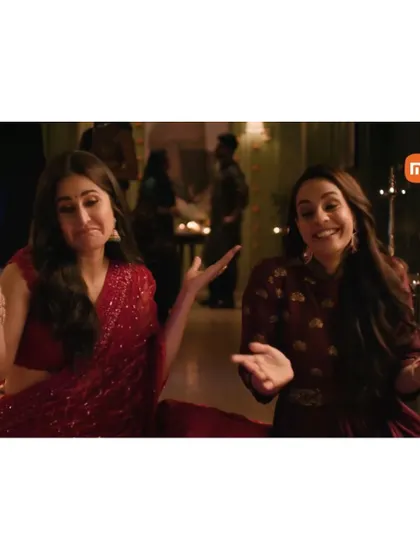 A fun moment captured on the set of the Xiaomi Diwali ad. The makeup for the cast was designed to be festive and cheerful, perfect for a lively dinner party scene.