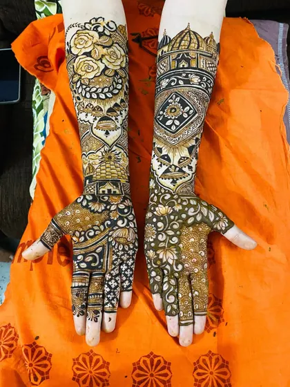 A creative design that combines rose motifs on one arm with geometric patterns on the other, yet feels completely balanced.