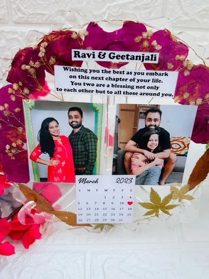 A clear shot of the frame's contents, including the custom message wishing the couple well on their new chapter.