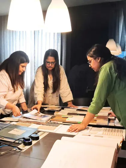 A candid moment of collaboration in our studio. Every space we create is a story of many minds at work, fueled by discussion, debate, and a shared passion for design.