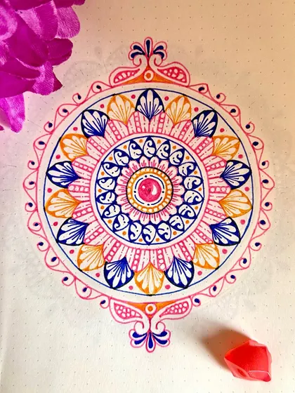 The same ornate mandala, a perfect example of the kind of art you can create anywhere, with just a few pens and a notebook.