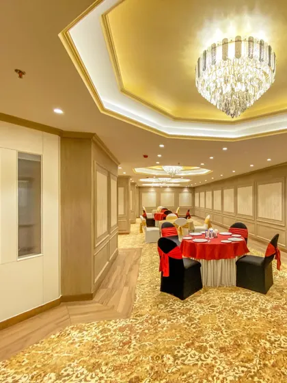A pre-function corridor in the Bhopal project, elegantly appointed for an event. The space is designed to be both beautiful and practical for guest circulation and service.