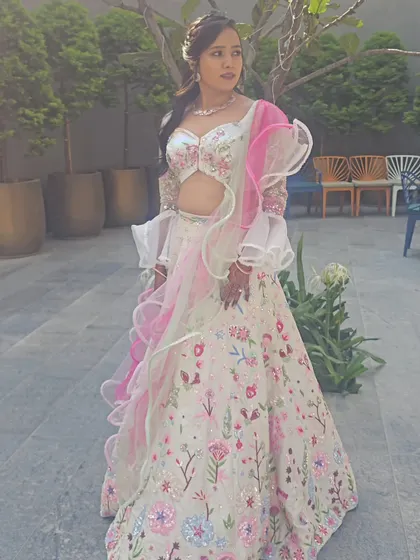 A full view of Anjali's whimsical Carnival outfit, showing how the hair and makeup complete the entire look.