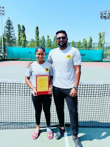 Our player Eshita with her coach after becoming the Singles Finalist at the U-16 SS in Guwahati, a testament to her resilience.