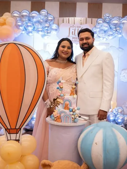 The parents-to-be at their hot air balloon themed baby shower. Their happiness is my success.