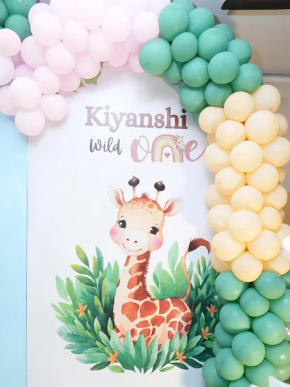 A personalized 'Wild One' panel for Kiyanshi's birthday, featuring an adorable giraffe.