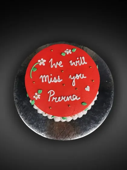 A simple red farewell cake. Sometimes a heartfelt message is the most important decoration.