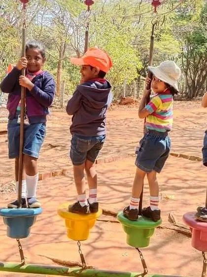 The adventure playground at Jain Farm was a big hit, with students challenging themselves on the balancing beams.