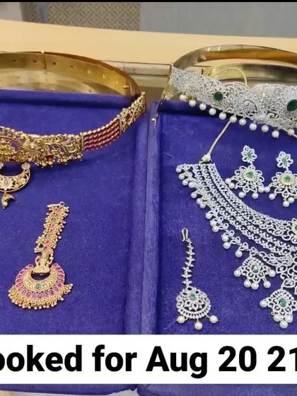 This combination of a traditional Kempu set and a modern diamond-look set has been booked for a wedding. It's a great example of choosing different styles for different functions.
