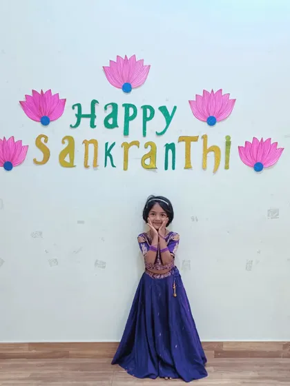 A cute pose from one of our little Asters, beautifully dressed for the Makar Sankranti festival.