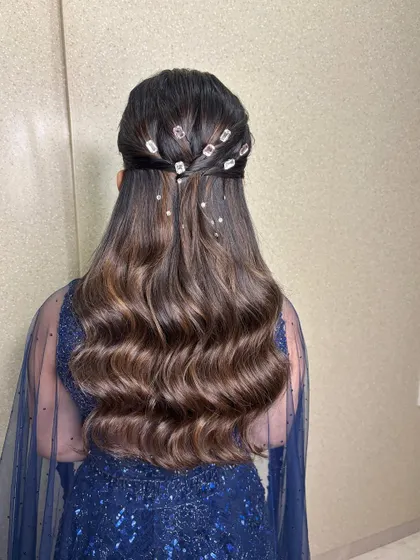 For a touch of fairytale magic, I added these sparkling crystal hair accessories to soft, voluminous waves for a Sangeet look.