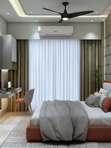 A view of the study nook and window area in the bedroom. The design is clean, simple, and makes the most of the available space and natural light.