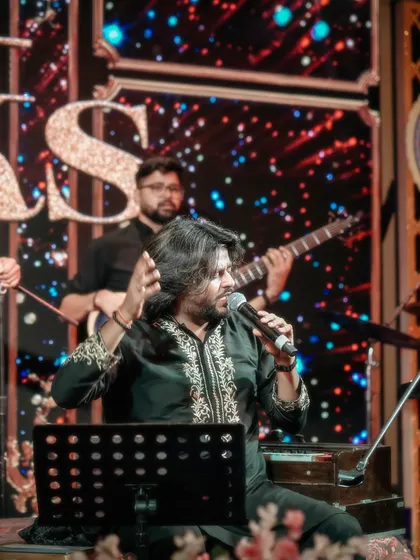Another angle of a passionate performance, showing my expressive hands which are as much a part of the storytelling as my voice.