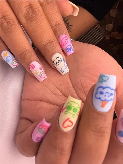 Cute and playful character art. This set of square-shaped extensions features adorable, hand-drawn pandas and other pastel cartoon figures, perfect for when you want your nails to show off your fun side.