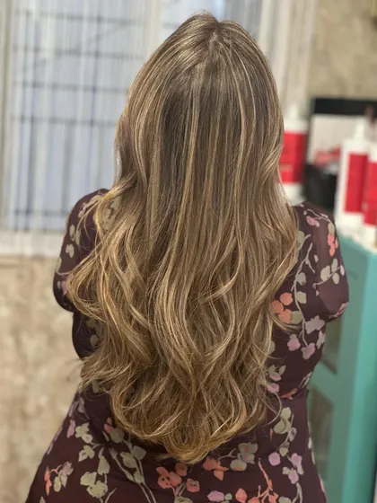 The back view of this long, flowing blonde hair.