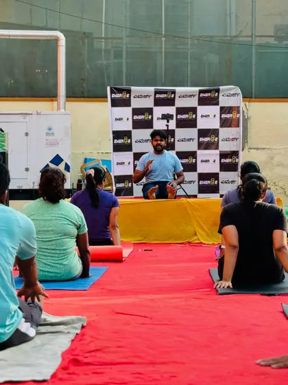 An instructor leads a session, sharing knowledge and guiding members towards mindfulness and physical well-being.