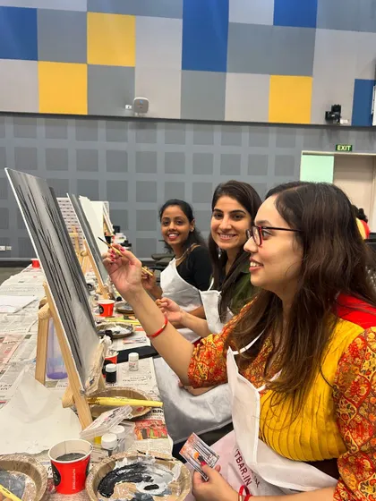 Smiles and focus at the Adobe workshop. It's a great mix of individual creativity and shared experience.