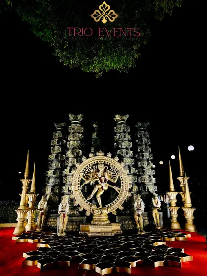 A vertical shot of the grand Nataraja installation, emphasizing its scale and the divine blessings it represents for the start of a grand celebration.