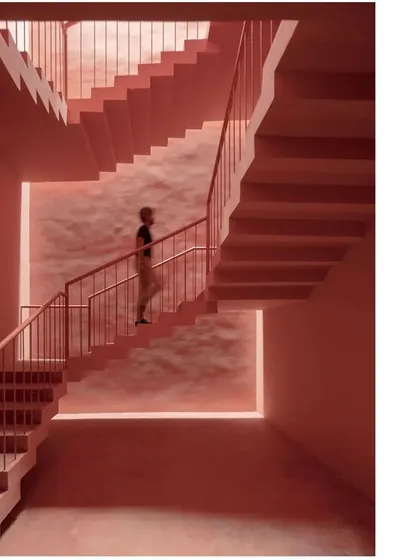 This image captures the dynamic geometry of the staircase, a key circulation element within the memorial building.