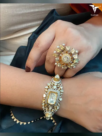 Make your celebrations as vibrant as my Polki jewellery. This stunning floral ring and bracelet set is crafted for you to remember the rich traditions.