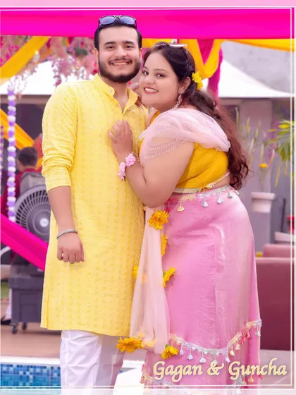 A happy portrait of Gagan and Guncha at their colorful Haldi event.