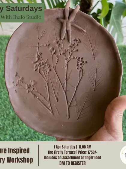 A finished piece from our nature-inspired pottery workshop, featuring delicate leaf imprints and a handcrafted dragonfly. You'll learn basic techniques like slab making and pinching to create your own unique dish.