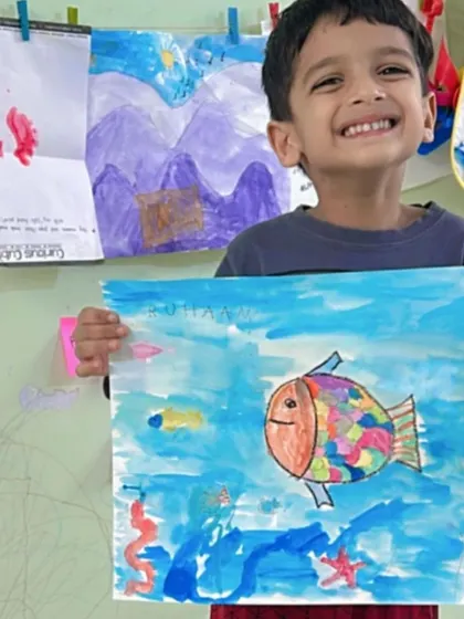 A colorful fish inspired by the story of "The Rainbow Fish." Our online classes often integrate literature to spark creativity and teach valuable lessons.