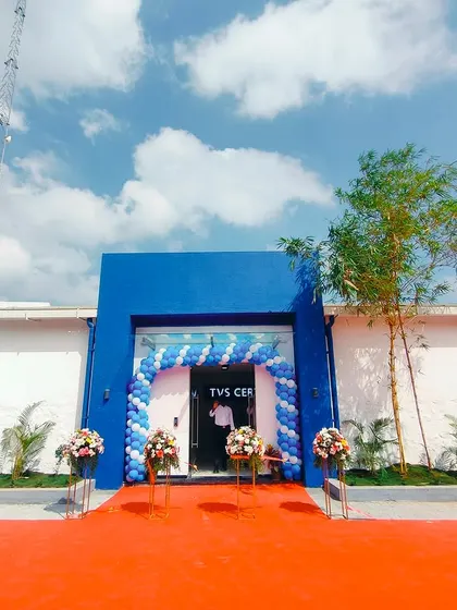The exterior entrance to the TVS Car Auction Centre. We used a bold blue color for the portal to make it a prominent landmark and create a strong sense of arrival for visitors.
