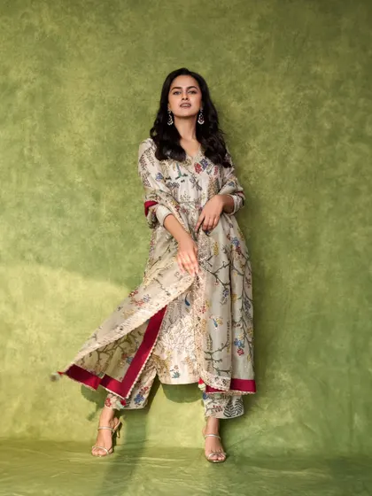 The full look of this floral print kurta-style saree set. The unique silhouette with pants underneath is a modern and comfortable take on traditional wear.